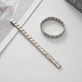 Dettaglio del bracciale modulare in acciaio inossidabile con impronte di zampe dorate - Impronta di Zampa con Accento Dorato (BD-199) / 9mm / Bicolore Argento Oro