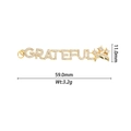 Détail macro du pendentif GRATEFUL doré avec micro-pavage de zircones blanches - Style GRATEFUL (DZ-2863)