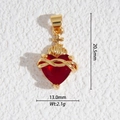 Vue détaillée du pendentif cœur sacré avec pierre rouge et détails dorés - Cœur Sacré Religieux (DZ-3238)