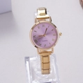 Detail view of a gold quartz watch with a purple sunray dial and Roman numeral markers - Gold Purple Roman Numeral Dial (WT052)