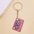 Retro pink cassette tape keychain with Record The Beauty text and gold metal chain - Pink Trendy Cassette Style (F)