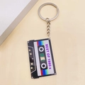 Retro 80s music cassette tape keychain with Best of 1980s print on acrylic material - Color Striped Retro Cassette Style (O)