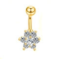 Detail of gold belly ring featuring a sparkling zircon flower pendant and polished bead - Golden Flower Style (JE0059B)