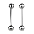Détail macro de piercings barbell en acier inoxydable poli avec embouts sphériques - Acier