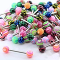Close-up of mixed colorful acrylic tongue rings with various patterns and metal bars - A Style Tongue Ring (Set of 10)