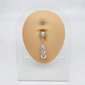 Silver stainless steel belly ring featuring four graduating clear zircon stones - Graduated Four Zircons Style (JE0069A)