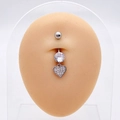 Detail of silver heart navel piercing with cubic zirconia on a mannequin model - Silver Large Zirconia Heart (JE0430C)