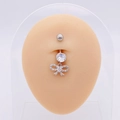 Silver bow dangle navel ring with sparkling white zircon stones on a model - Silver Bowknot Dangle (JE0430E)