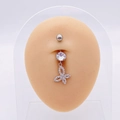 Silver stainless steel belly ring with AAA zircon butterfly dangle on a silicone model - Silver Hollow Butterfly Style (JE0430Q)