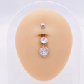 Polished silver heart pendant belly ring with clear zircon on a silicone model - Silver Heart Dangle Style (JE0430T)
