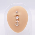Silver stainless steel navel ring with crystal anchor pendant on realistic skin model - Silver Pave Anchor Style (JE0430U)