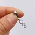 Silver stainless steel belly ring featuring three vertical round clear cubic zirconia stones - Silver Triple Zirconia Step (JE0428T)