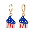 Detailed close-up of cupcake pendant earrings with American flag enamel and gold plating - Red White Blue Cupcake (JE0768F)