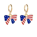 Detailed view of golden bow earrings featuring red, white and blue American flag motifs - Red White Blue Bowknot (JE0768I)