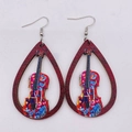 Macro detail of teardrop wooden earrings with hollow violin design and floral patterns - Violin Style (JE0800E)