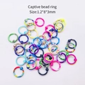 Lot de 10 anneaux à boule captifs colorés 1.2x8x3mm pour piercings nez et oreilles - Anneau à Boule Captive (JE0406A) / Lot de 10 / Multicolore