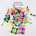 Barbell piercing en acier inoxydable motif éclaboussures de couleur 1.2*6*3mm pour oreille - Clou de Piercing Haltère (JE0412C) / Lot de 10 / Multicolore