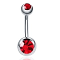 Detailed macro view of curved stainless steel belly ring with double red faceted gems - Red