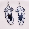 Detailed view of surreal mushroom earrings with monochrome bikini girl figures - Swimsuit Mushroom Figure (JE0921D)