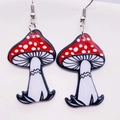 Close-up of red and white spotted mushroom acrylic dangle earrings with silver hooks - Red Polka Dot Mushroom (JE0921E)