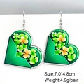 Dettaglio orecchini a cuore con trifoglio per San Patrizio, dimensioni 7,0x4,8 cm e peso - Stile trifoglio verde arancio a forma di cuore (JE1205F)