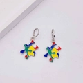 Close-up of colorful jigsaw puzzle heart earrings in silver with vibrant enamel detail - Puzzle Piece Style (JE1295C)