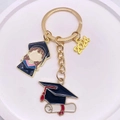 2024 Graduation souvenir keychain with golden metal charms and blue graduation cap - 2024 Year Cartoon Girl Doctor Hat Style (JE1308G)