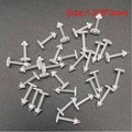 Macro shot of 1.2x8x3mm clear acrylic ear labret studs with flat base design - 1.2*8*4mm