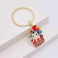 Detail of cartoon scholar graduation keychain with golden metal ring and enamel pendant - Cartoon Red Official Zhuangyuan Style (JE1364G)