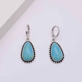 Detail of bohemian turquoise teardrop earrings with vintage silver beaded metal edges - Teardrop Turquoise Style (JE1355F)