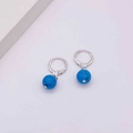 Silver hoop earrings featuring a round dark blue turquoise bead pendant for daily wear - Dark Blue Textured Bead Style (JE1355C)