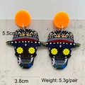 Dettaglio di orecchini a teschio in acrilico con indicazioni di dimensioni e peso nel prodotto - Teschio con Cappello Nero e Fiori Gialli (JE1442D)