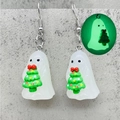 Luminous 3D ghost holding a Christmas tree earrings shown with glow-in-the-dark effect - Ghost Christmas Tree (JE1506A)