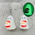 Glow-in-the-dark luminous ghost and Santa resin earrings shown in dark and light - Ghost Holding Santa (JE1506D)