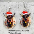 Close-up of highland cow acrylic earrings with Christmas hat and colorful lights details - Scarf Christmas Highland Cow Style (JE1511D)