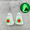 Detailed close-up of 3D glow-in-the-dark ghost earrings with holly berry leaf decor - Ghost with Holly (JE1506E)