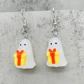 Close-up of spooky ghost earrings holding a gift box made of translucent resin - Ghost with Gift Box (JE1506G)