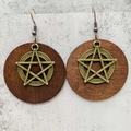Detail showing vintage wooden earrings with bronze star pendants and rustic texture - Bronze Pentagram Style (JE1542H)