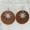 Detail shot of vintage wooden hoop earrings with silver sun pendant and metal hook - Silver Sunbeam Style (JE1542E)
