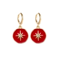 Detailed shot of golden hoop earrings featuring red enamel charms with star motifs - Red Star Round Style (JE1572B)