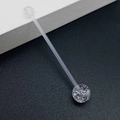 Macro shot of flexible UV acrylic barbell with glittery silver sequin ends for body piercing - Long Straight Barbell Piercing Jewelry / Transparent Silver Sequin Style (JE1587A)