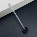 Macro detail of flexible bio-plastic industrial barbell with speckled accent beads - Flexible Long Straight Piercing Jewelry / Transparent Black And White Spotted Style (JE1587B)