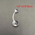 Macro shot of clear acrylic navel ring with 1.6x14mm dimensions and double ball design - 1.6x14mm Bar (JE1592C)