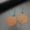 Detail of vintage wooden earrings with turquoise beads and bronze hooks on dark background - Round With Turquoise Bead Style (JE1552E)