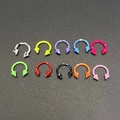Macro detail of ten colorful speckled stainless steel horseshoe rings with spike ends - Spike Speckled Style (JE0407) / 10 Pieces Pack / Colorful