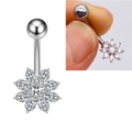 Macro detail of snowflake belly ring with sparkling AAA zircon inlay on stainless steel rod - Snowflake Style (JE0428P)