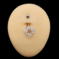 Silver stainless steel navel ring with crystal flower pendant shown on a model - Elegant Flower Style (JE1616J)