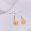 Detailed close-up of shell drop earrings with white pearls and gold starfish texture - Artificial Pearl Scallop Shell (JE1614K)