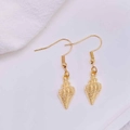 Macro shot of gold shell earrings featuring detailed spiral sea conch texture and hooks - Electroplated Shiny Golden Conch (JE1614G)