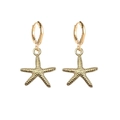 Boucles d'oreilles créoles dorées en forme d'étoile de mer avec texture marine - Étoile De Mer Texturée Dorée (JE1541F)